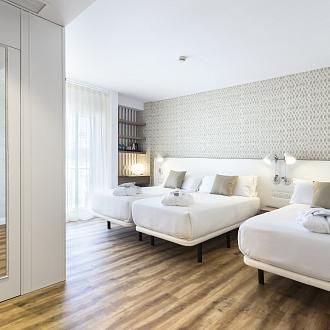 Habitación Triple Confort vista jardín