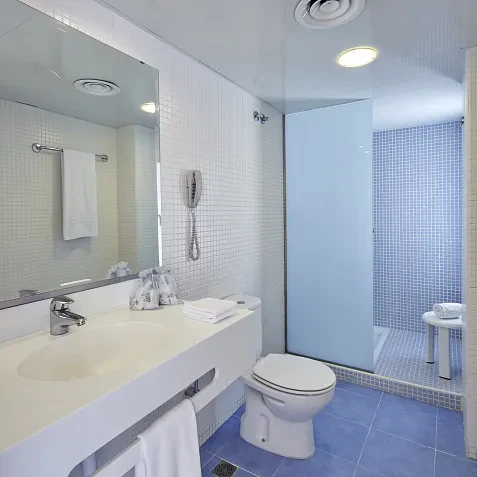 Habitación Triple Confort vista jardín